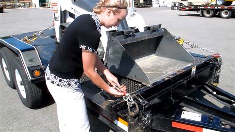 chaining down a skid steer|how to chain a youtube trailer.